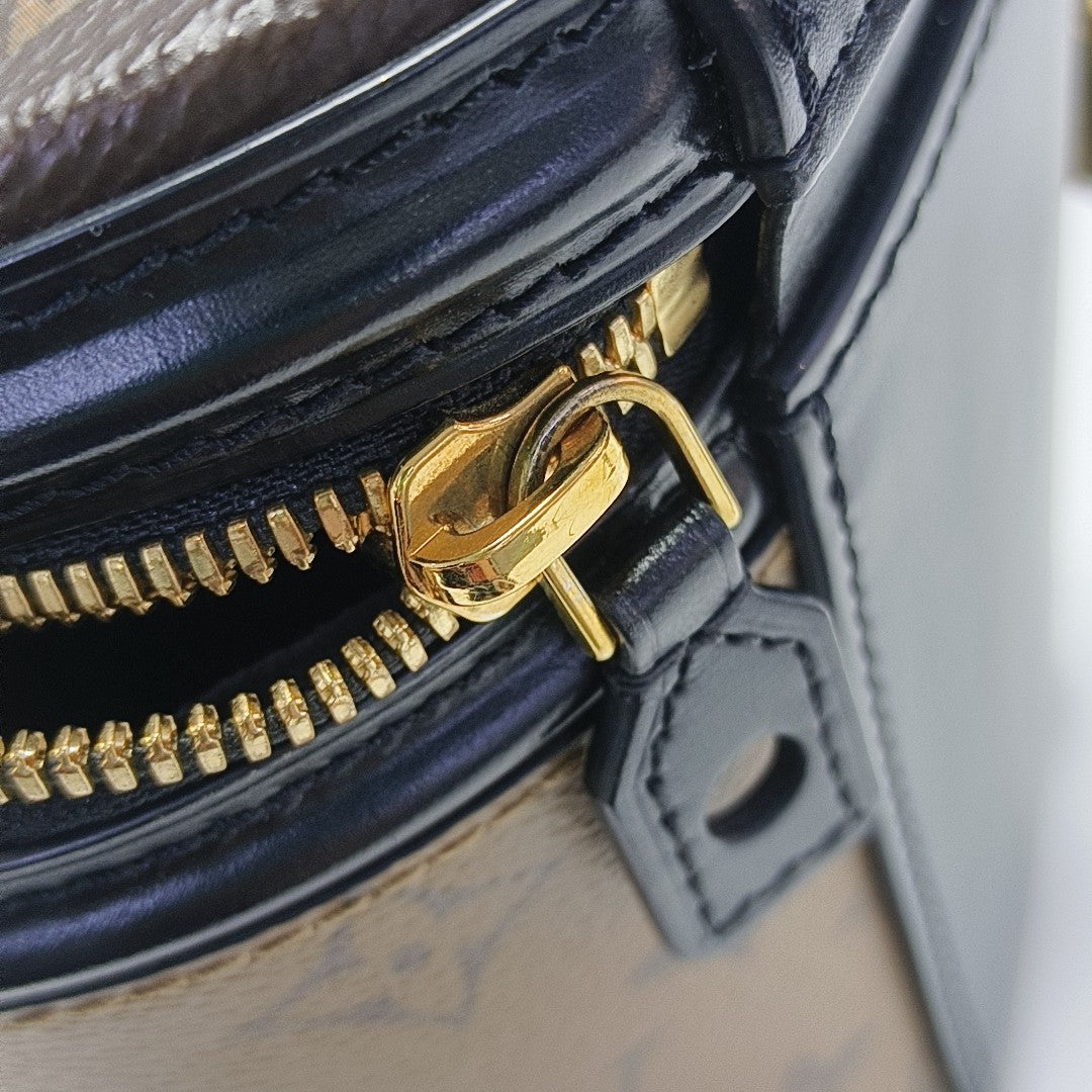 CANNES PM Monogram Coated Canvas Brown