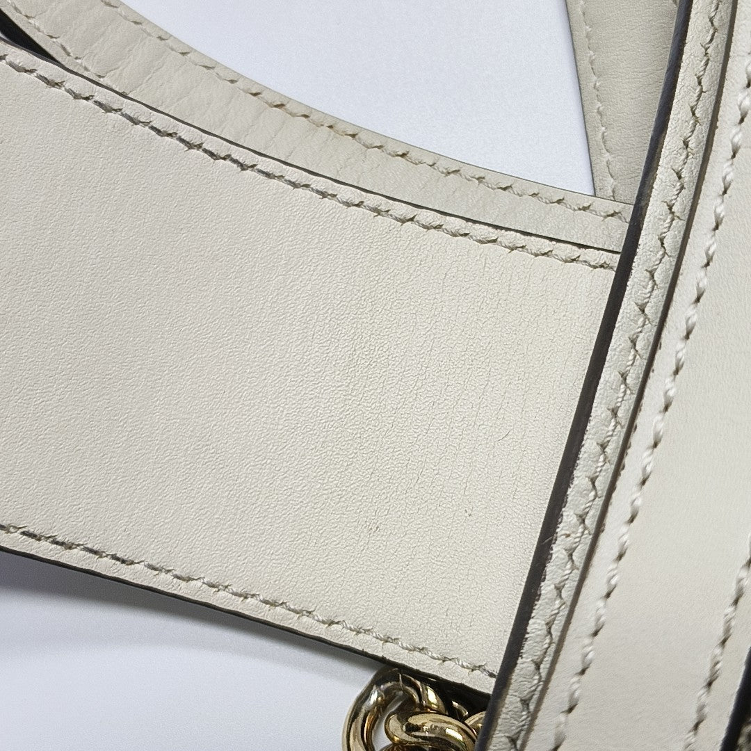 Padlock Small Monogram Coated Canvas Beige