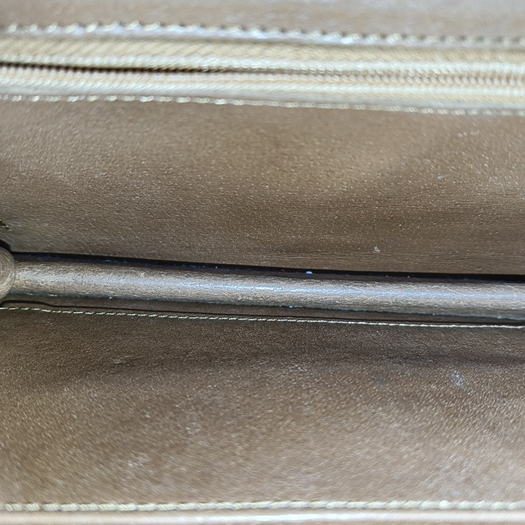DAME Monogram Coated Canvas Brown
