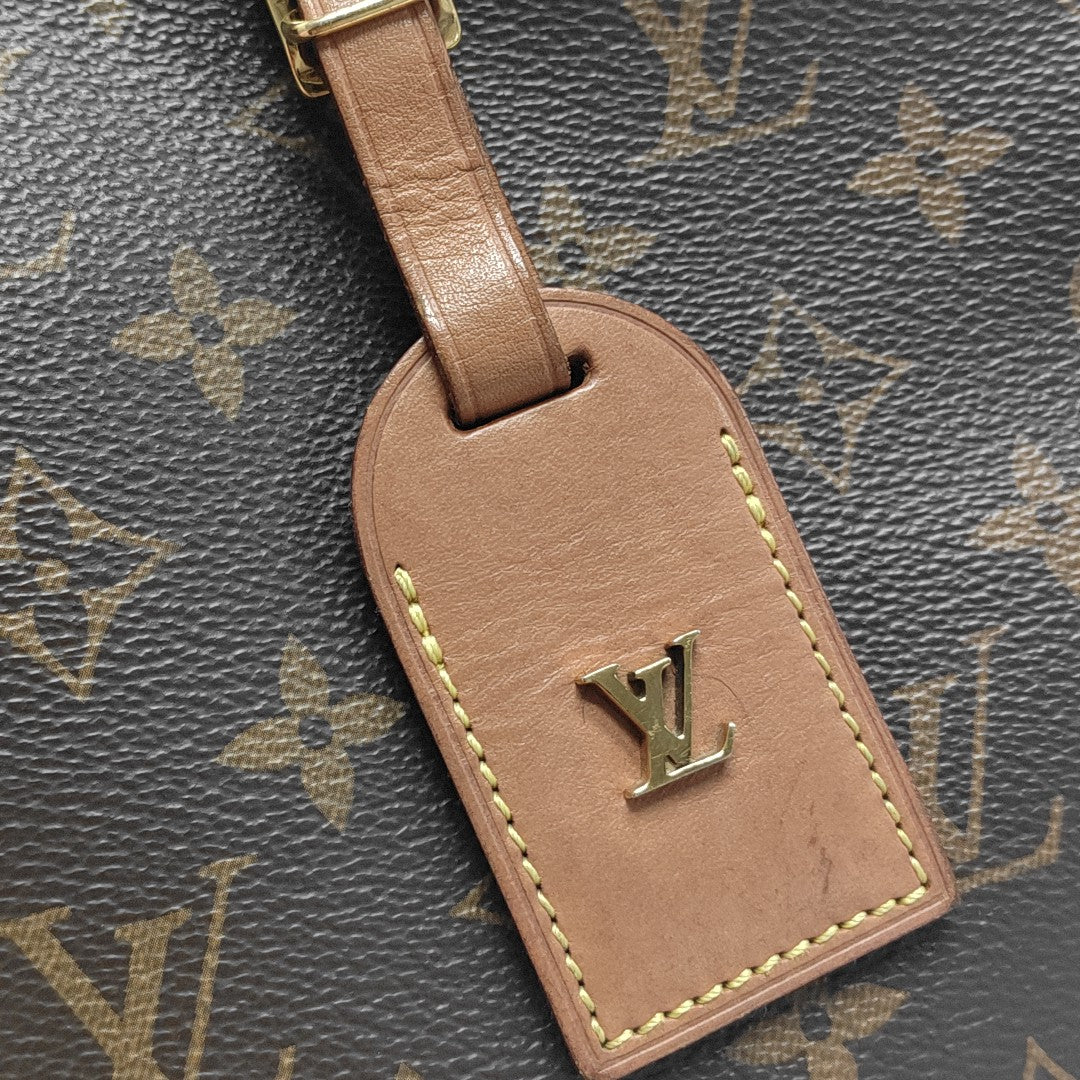 BOITE CHAPEAU MM Monogram Coated Canvas Brown