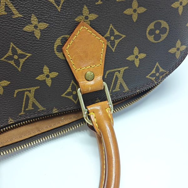 ALMA PM Monogram Coated Canvas Brown