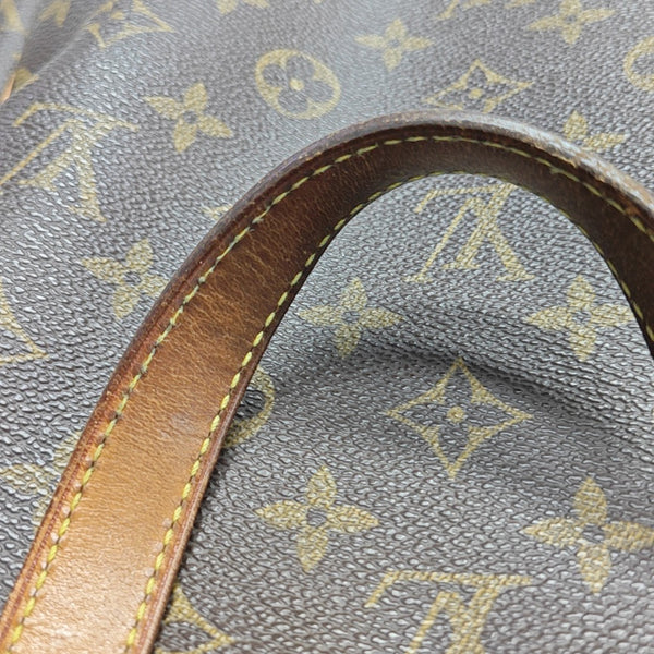 EXCURSION Monogram Coated Canvas Brown