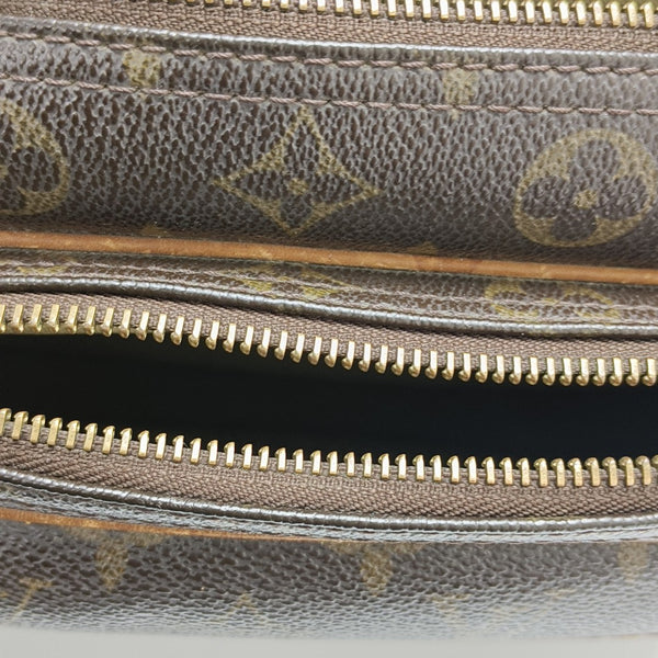 REPORTER Monogram Coated Canvas Brown