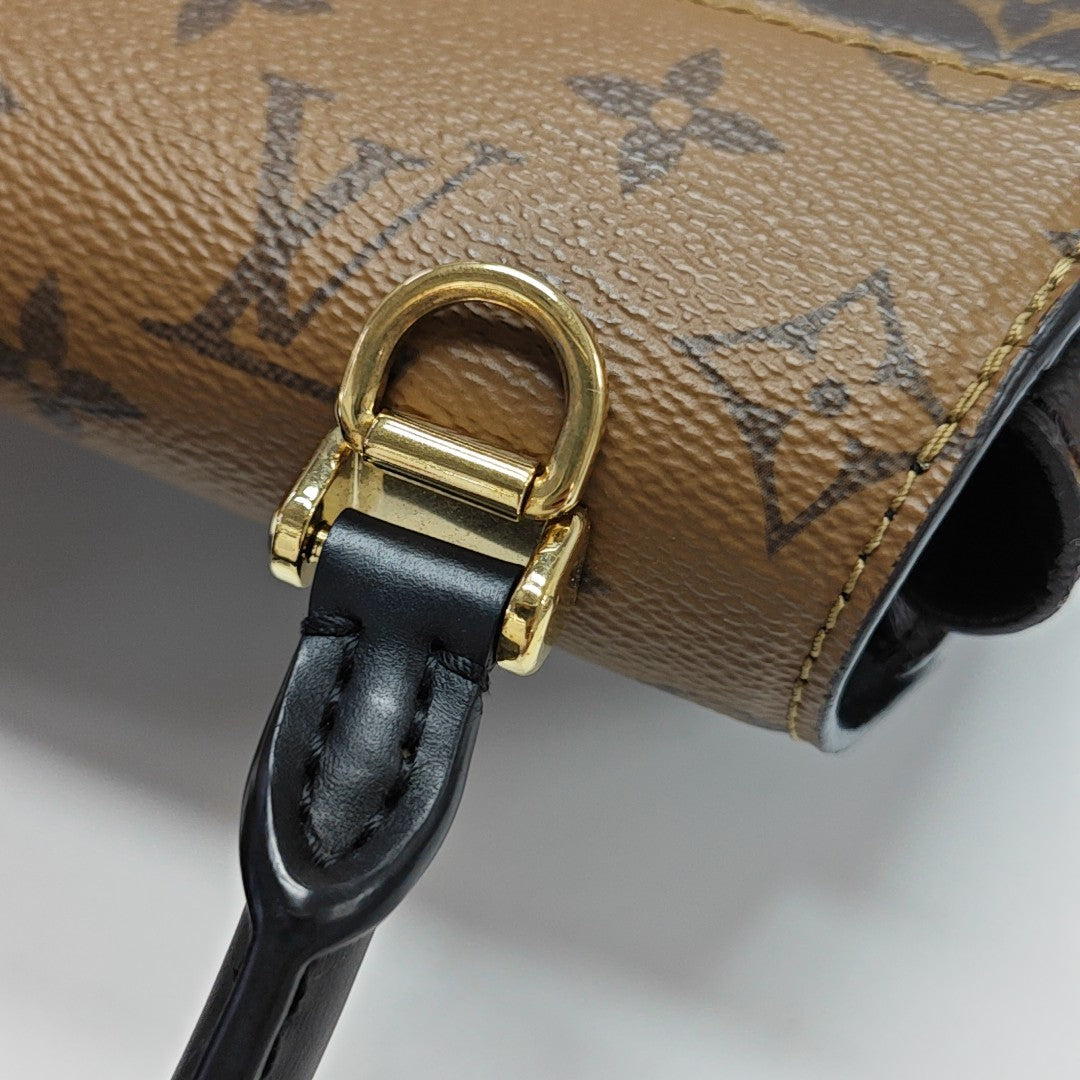 EDEN Monogram Coated Canvas Brown