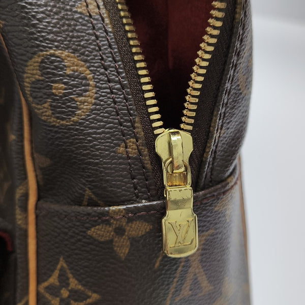 EXCENTRI-CITE Monogram Coated Canvas Brown
