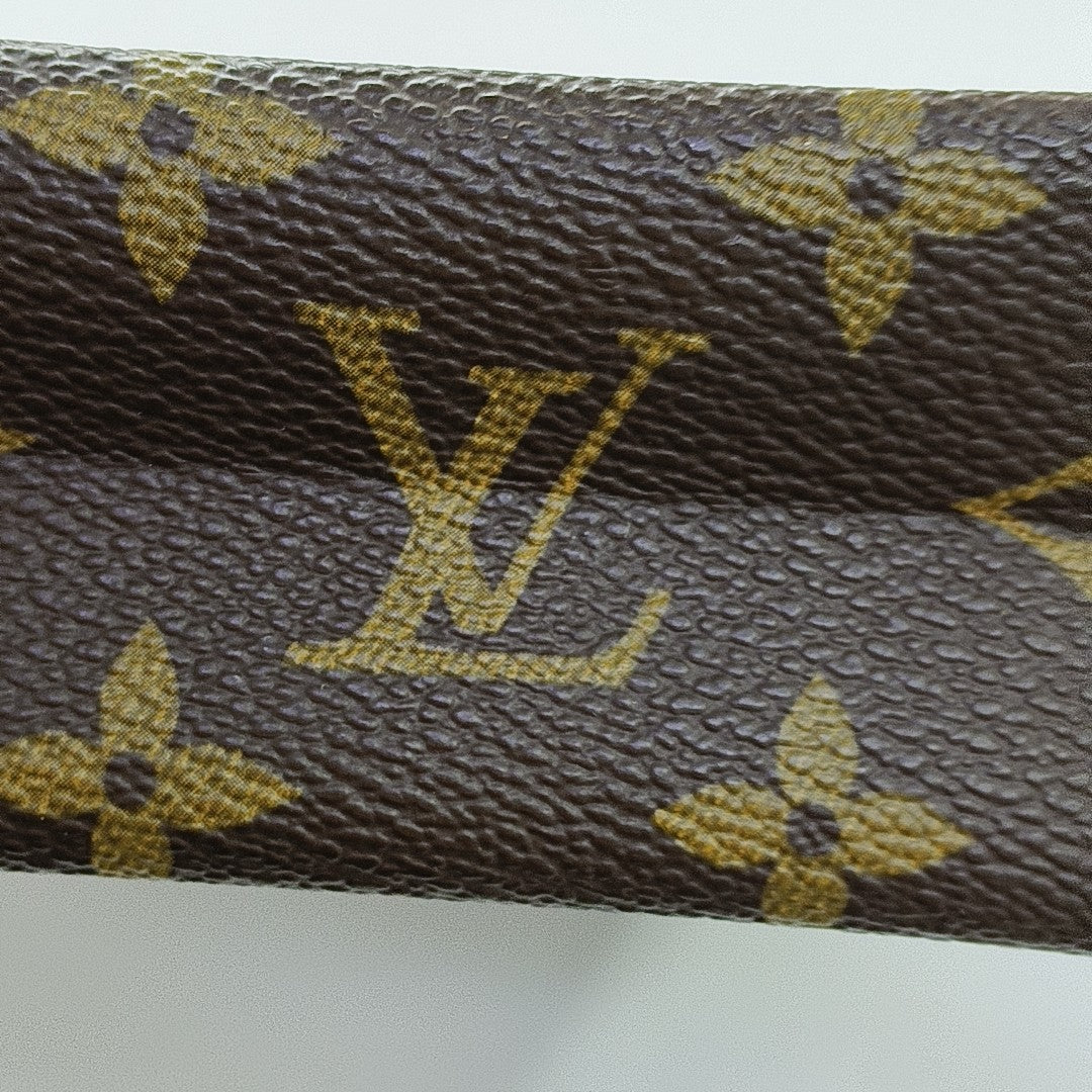 TOILET POCKET Monogram Coated Canvas Brown