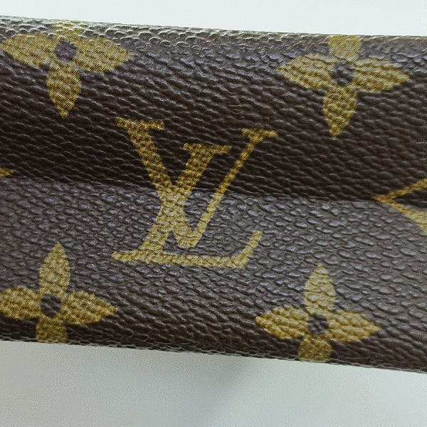 TOILET POCKET Monogram Coated Canvas Brown
