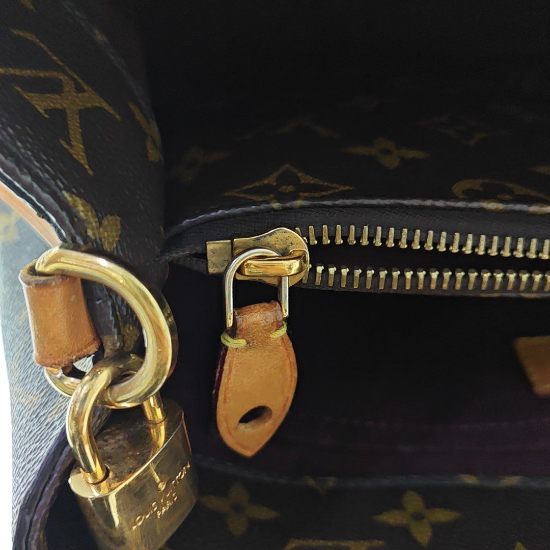 MONTAIGNE Monogram Coated Canvas Brown
