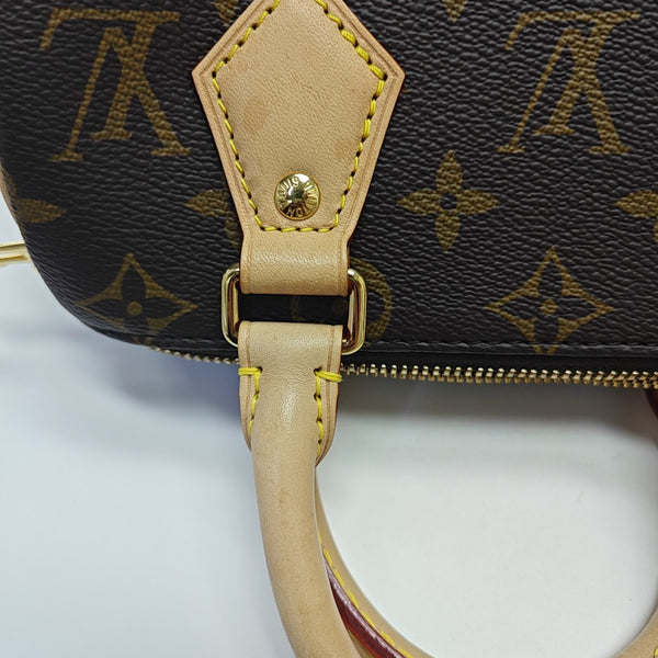 SPEEDY 20 Monogram Coated Canvas Brown