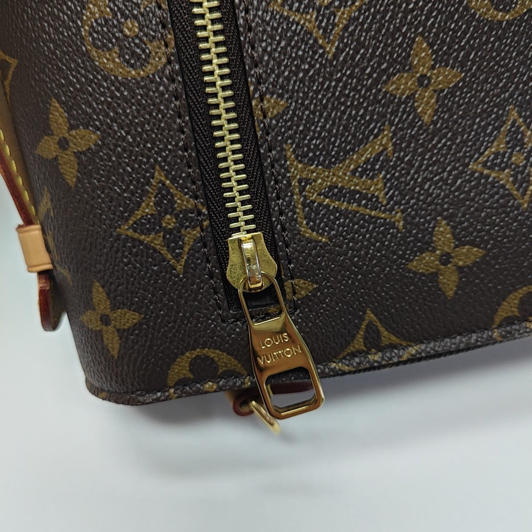 MÉTIS MM Monogram Coated Canvas Brown