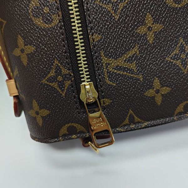 MÉTIS MM Monogram Coated Canvas Brown