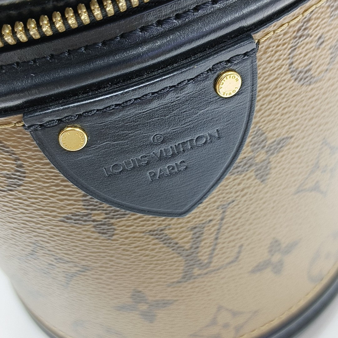 CANNES PM Monogram Coated Canvas Brown