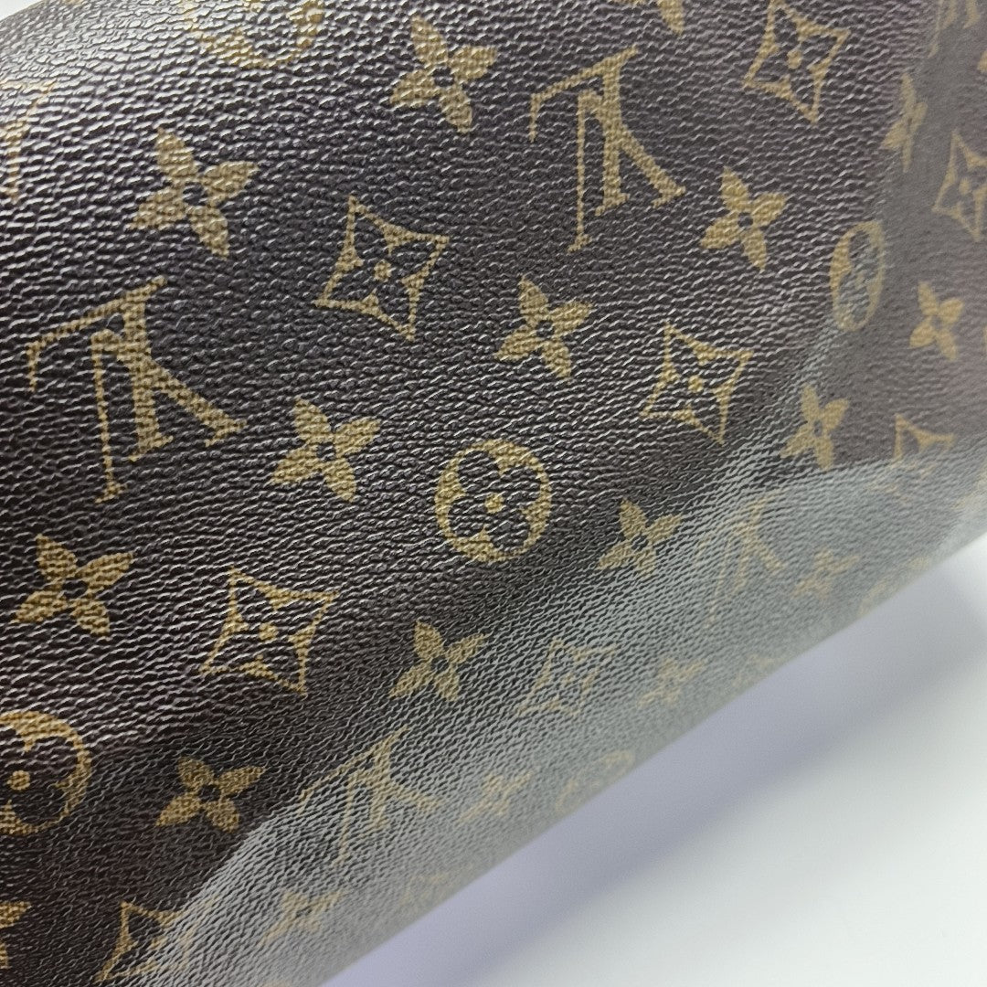 SPEEDY 30 Monogram Coated Canvas Brown