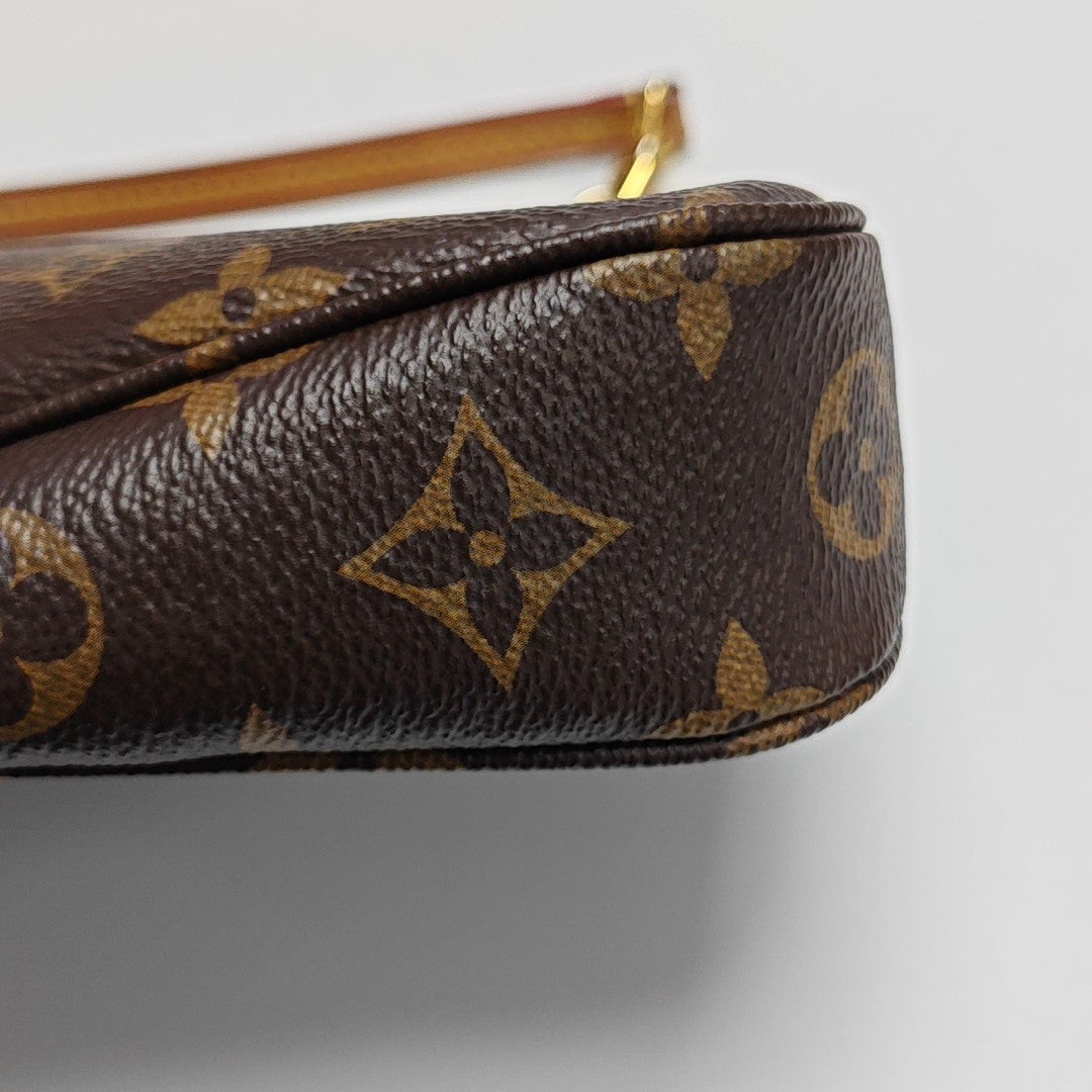 ACCESSOIRES GM Monogram Coated Canvas Brown