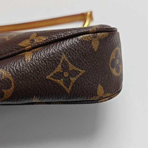 ACCESSOIRES GM Monogram Coated Canvas Brown