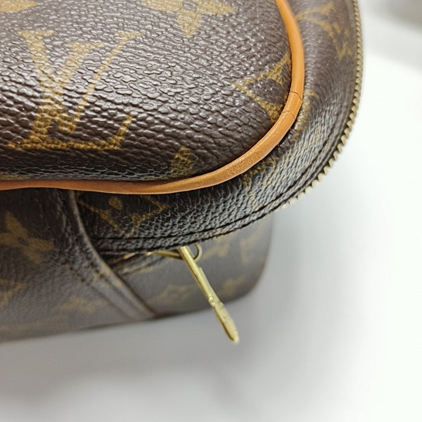 EXCURSION Monogram Coated Canvas Brown