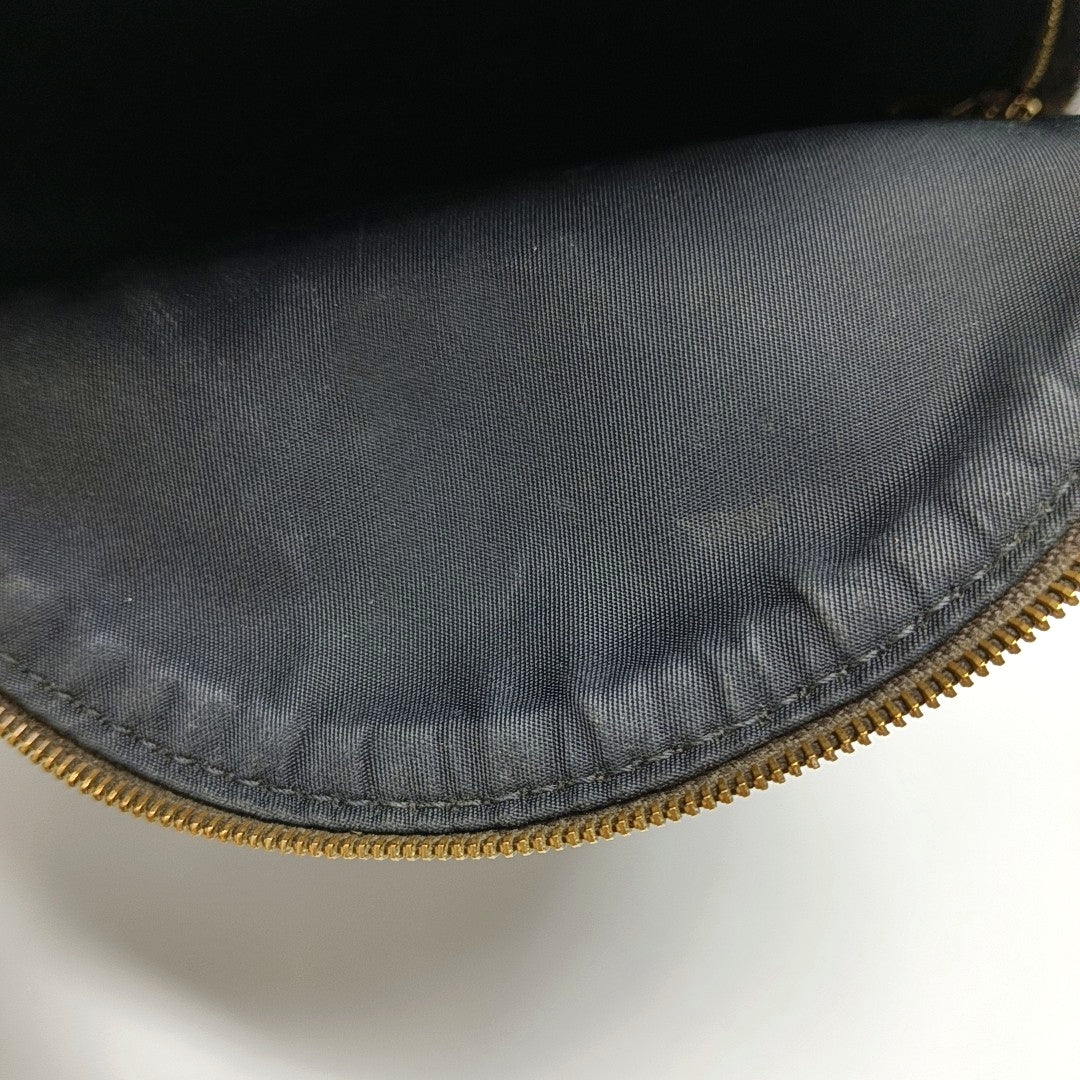 Authenticated pre-owned  PALM SPRINGS Mini Monogram Coated Canvas Brown - Backpack at Looply