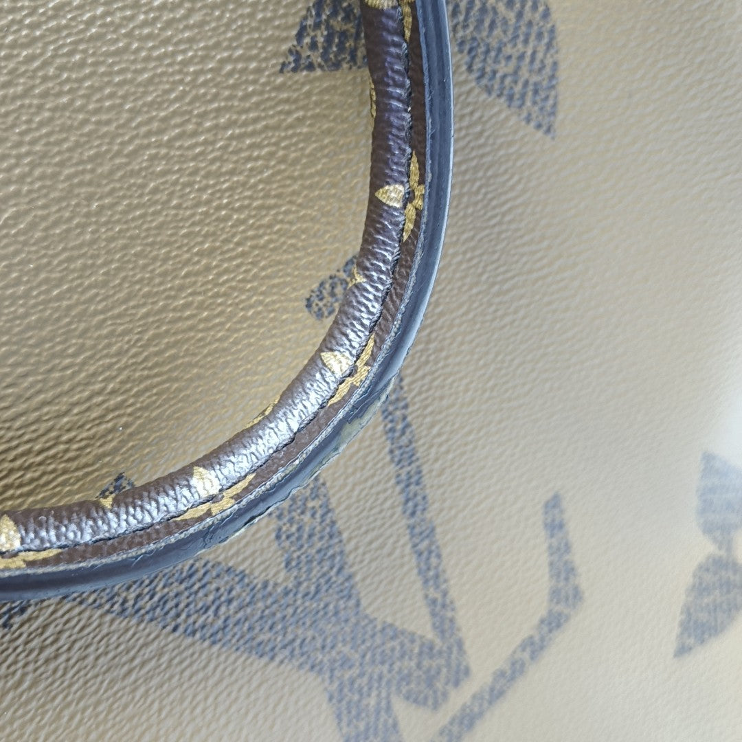 ONTHEGO GM Monogram Coated Canvas Brown