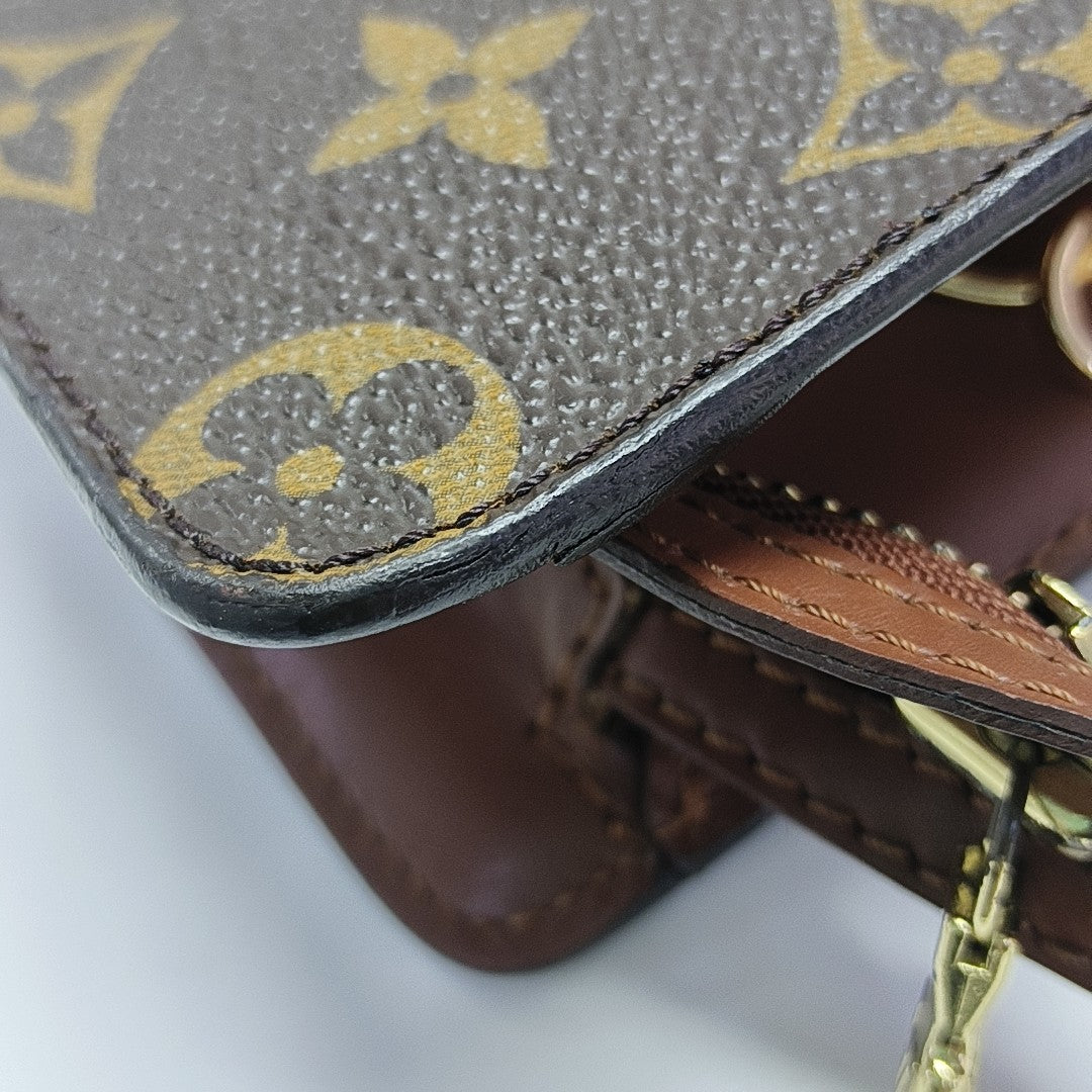 Monogram Coated Canvas Clutch Brown