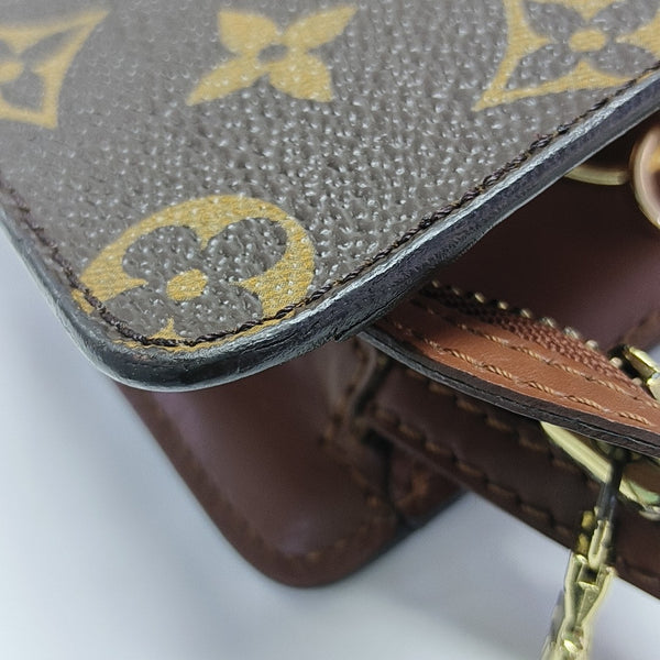 Monogram Coated Canvas Clutch Brown
