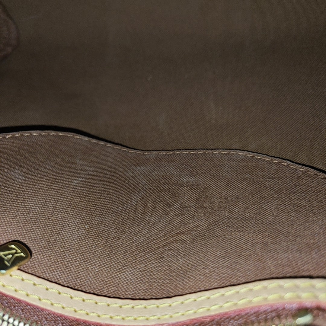 SPEEDY 25 Monogram Coated Canvas Brown