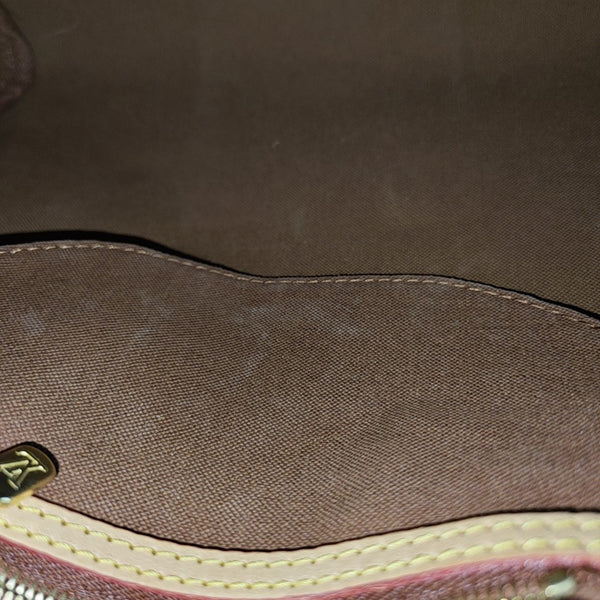 SPEEDY 25 Monogram Coated Canvas Brown