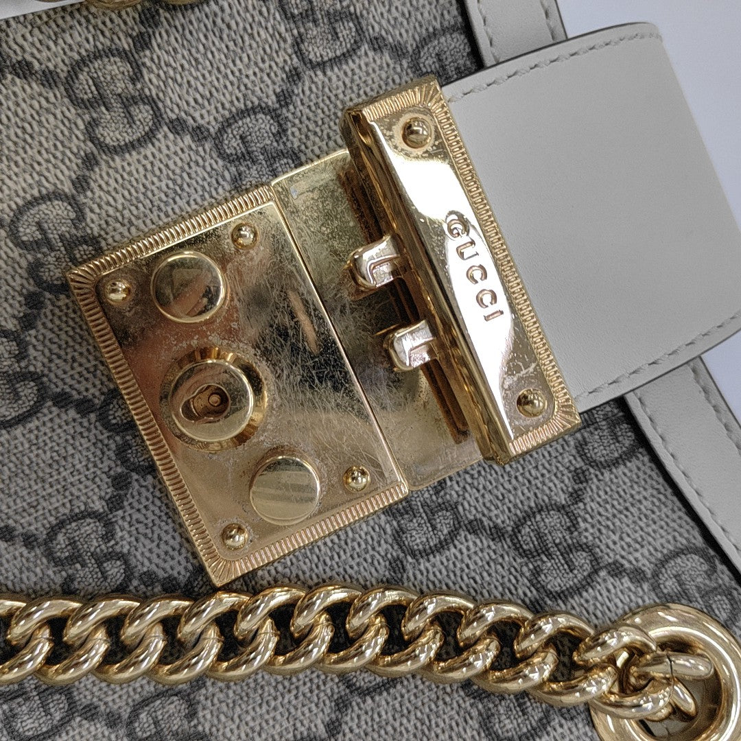 Padlock Small Monogram Coated Canvas Beige
