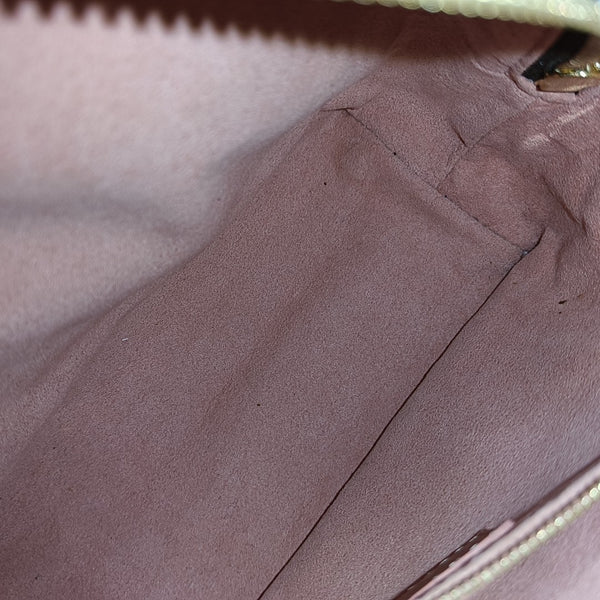 PETITE MALLE Monogram Coated Canvas Brown