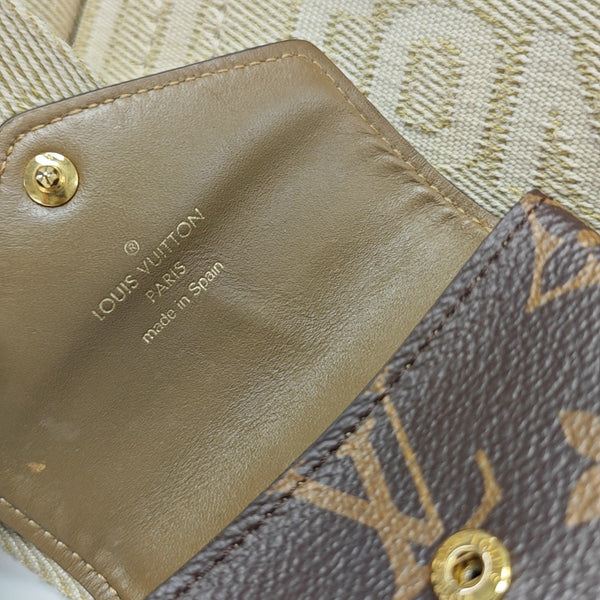 UTILITY Monogram Coated Canvas Brown