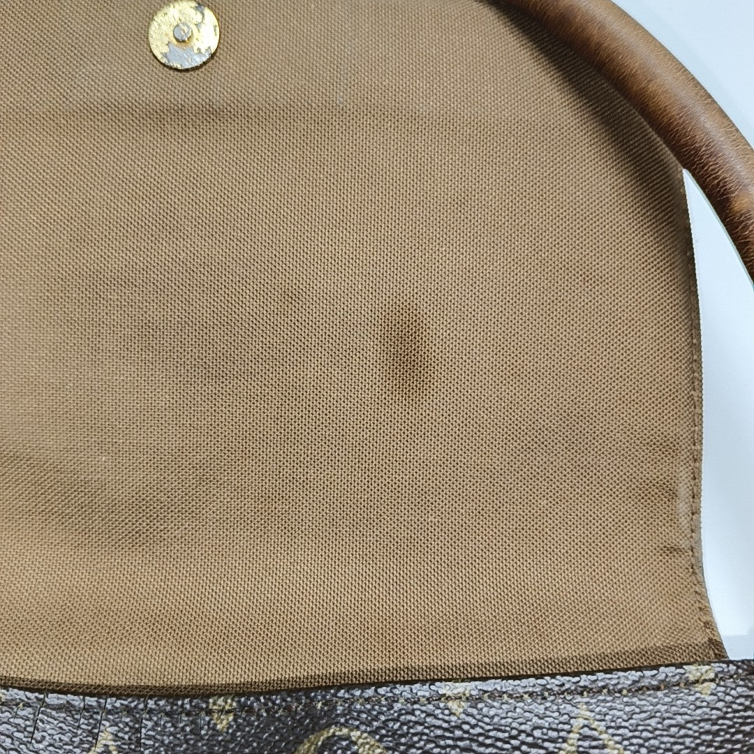 LOOPING PM Monogram Coated Canvas Brown