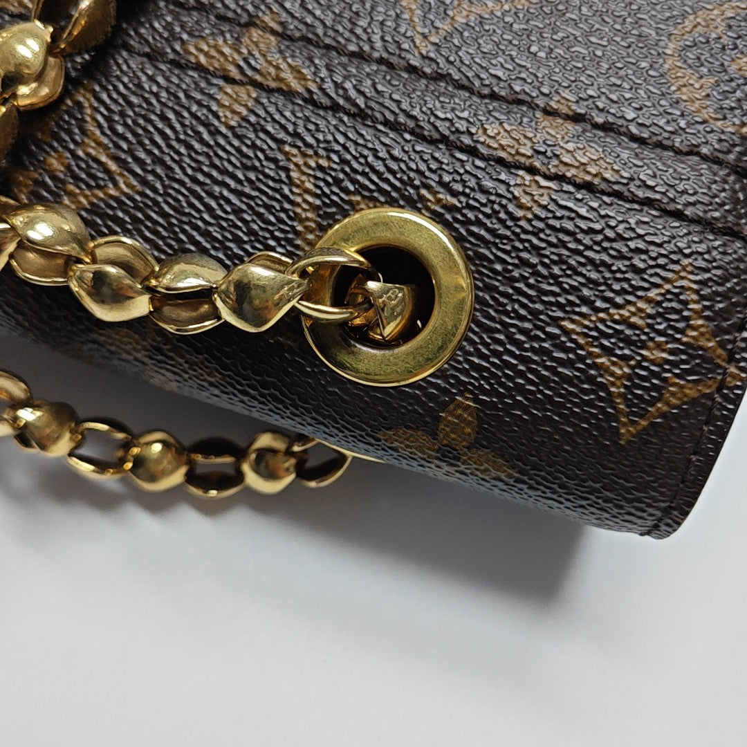 VICTOIRE Monogram Coated Canvas Brown
