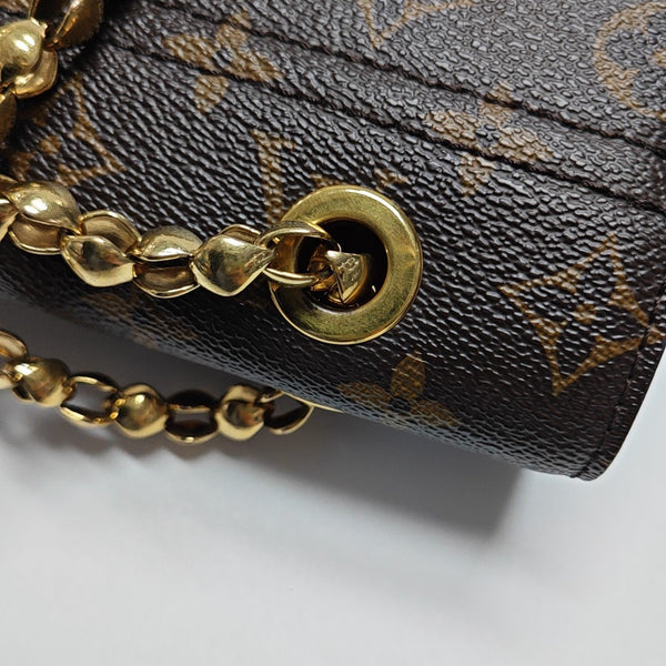 VICTOIRE Monogram Coated Canvas Brown