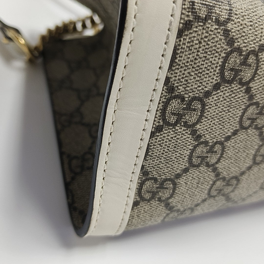 Padlock Small Monogram Coated Canvas Beige