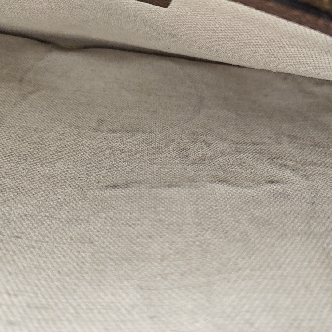 Monogram Coated Canvas Clutch Beige