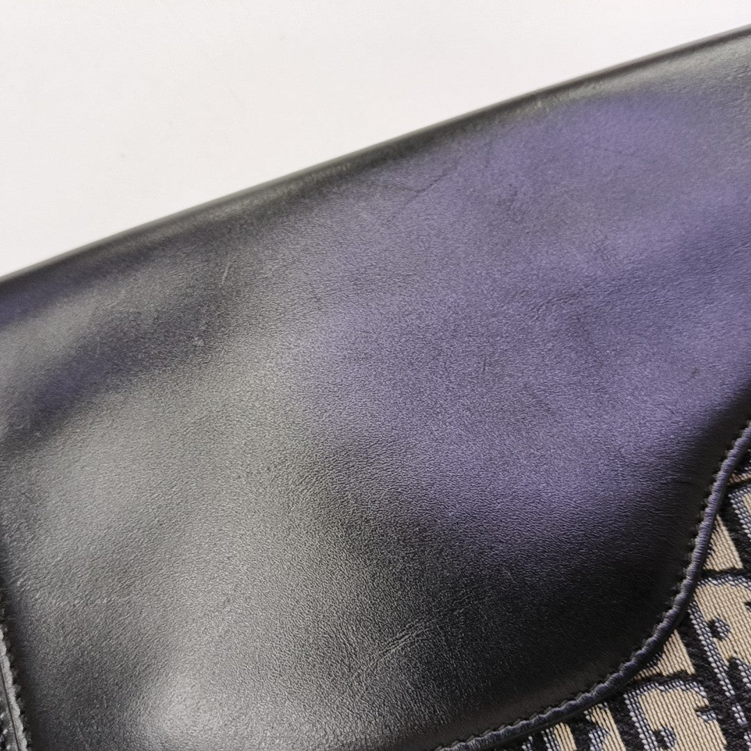 Oblique Canvas Clutch Blue