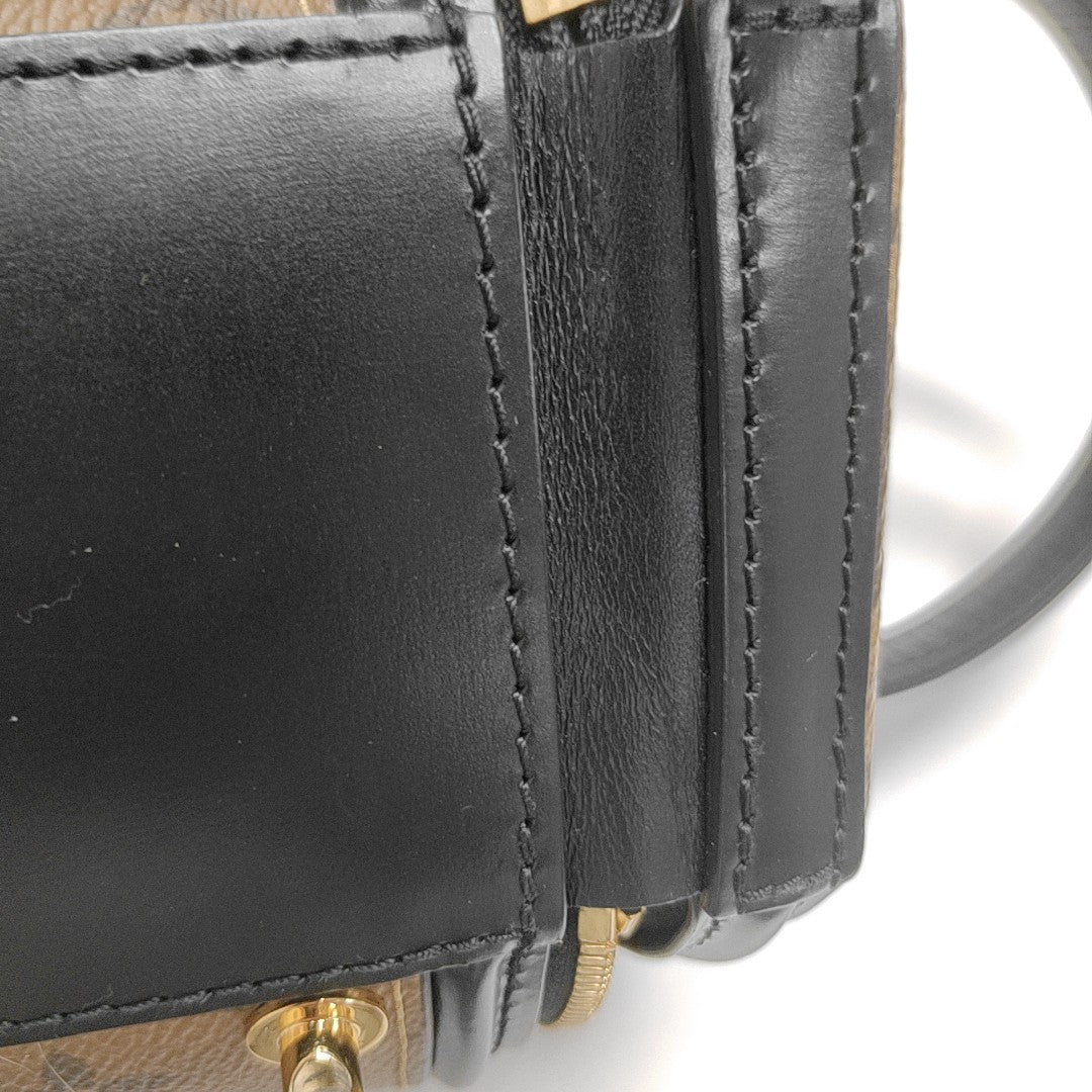 CANNES PM Monogram Coated Canvas Brown