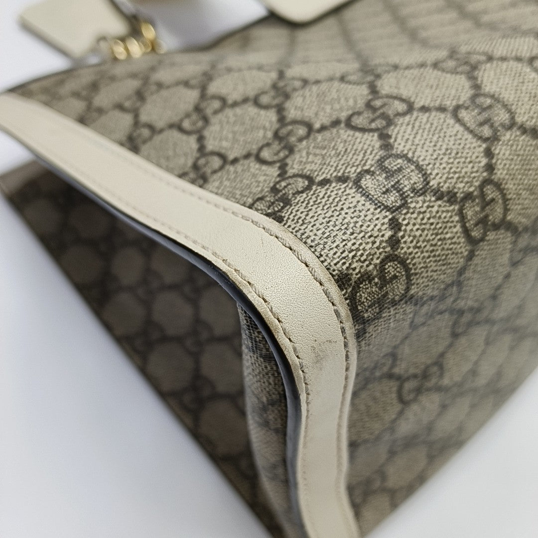 Padlock Medium Monogram Coated Canvas Beige