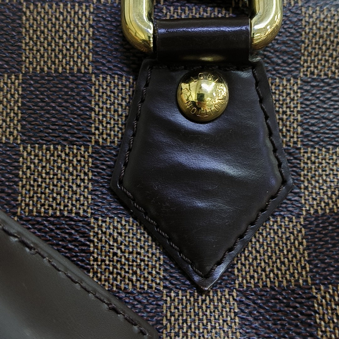 DUOMO Damier Ebene Coated Canvas Brown