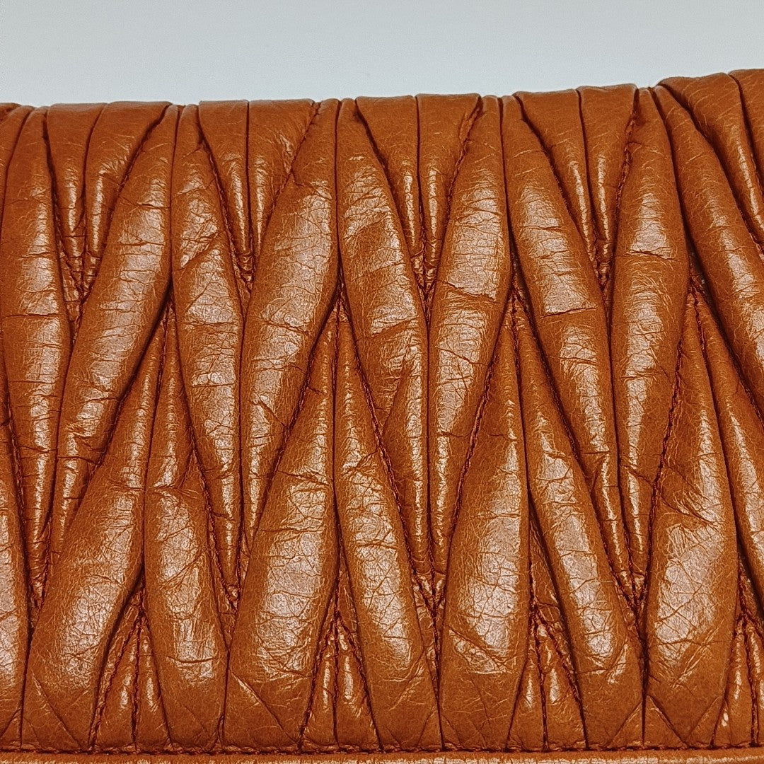 Quilted Lambskin Clutch Orange