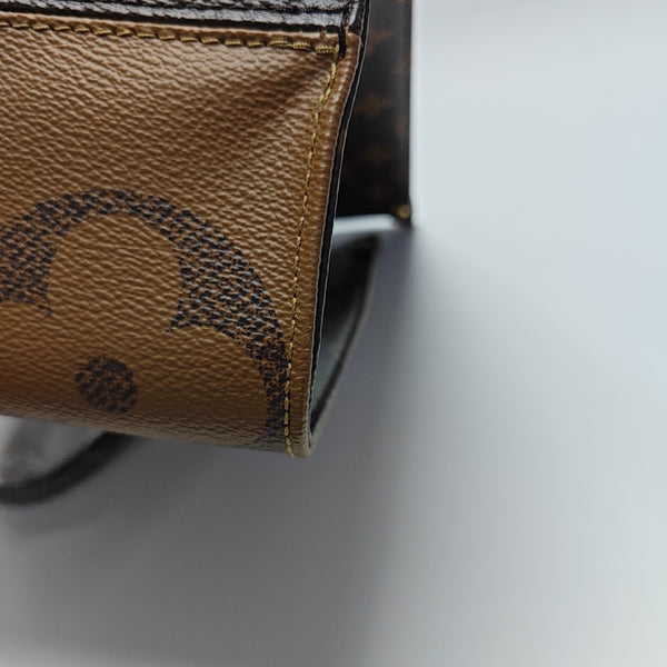 ONTHEGO MM Monogram Coated Canvas Brown