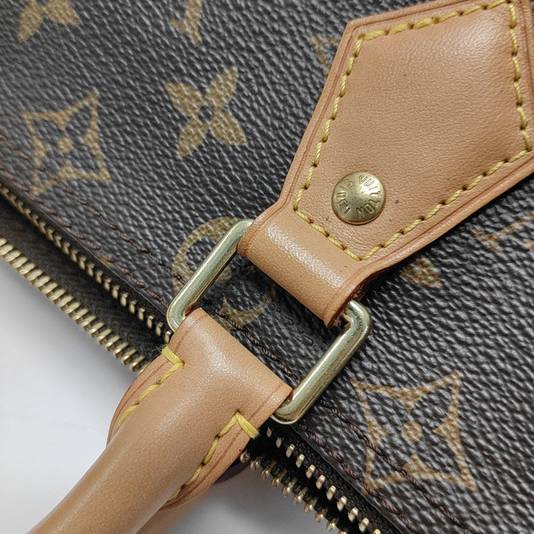 SPEEDY 25 Monogram Coated Canvas Brown