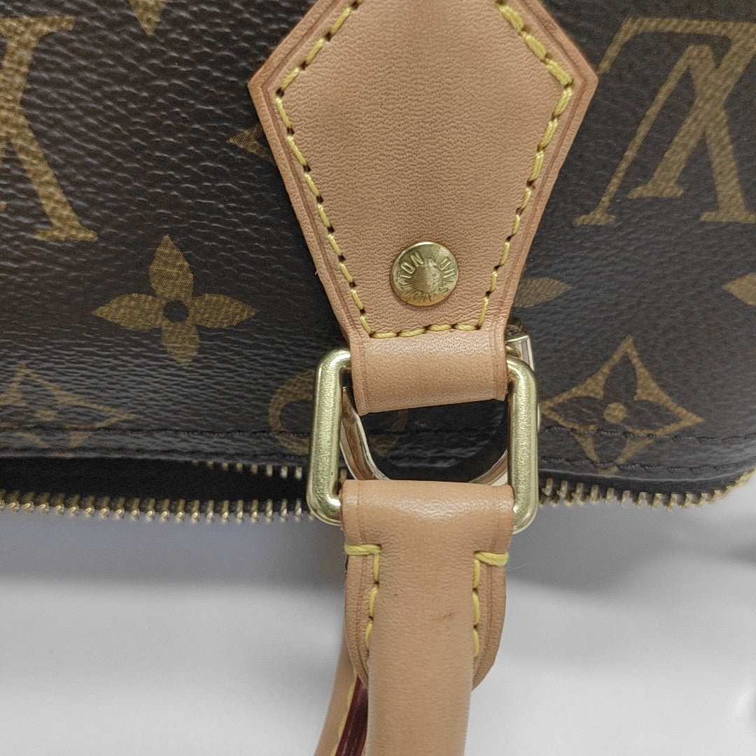 SPEEDY 25 Monogram Coated Canvas Brown