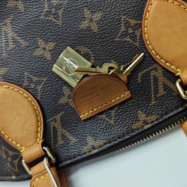 RIVOLI BB Monogram Coated Canvas Brown