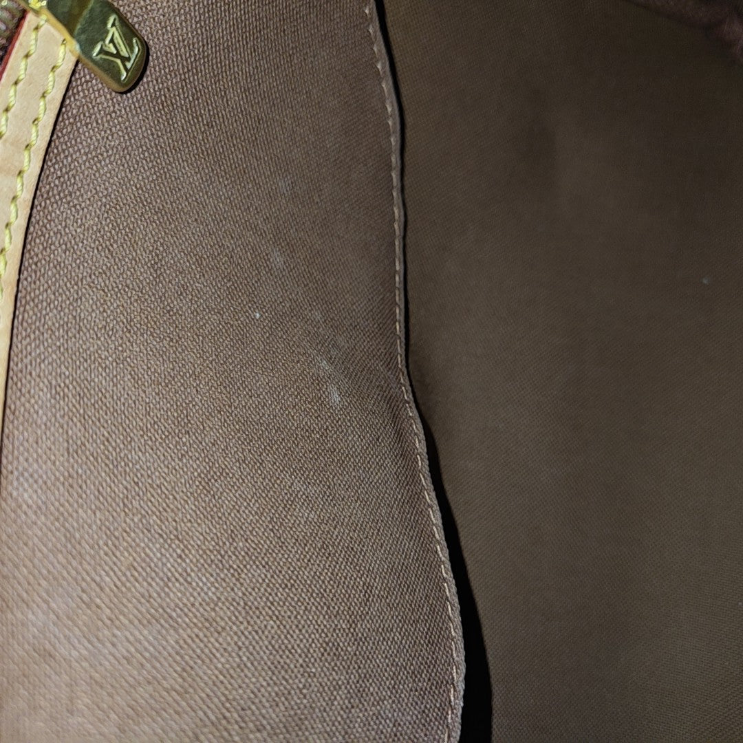 SPEEDY 25 Monogram Coated Canvas Brown