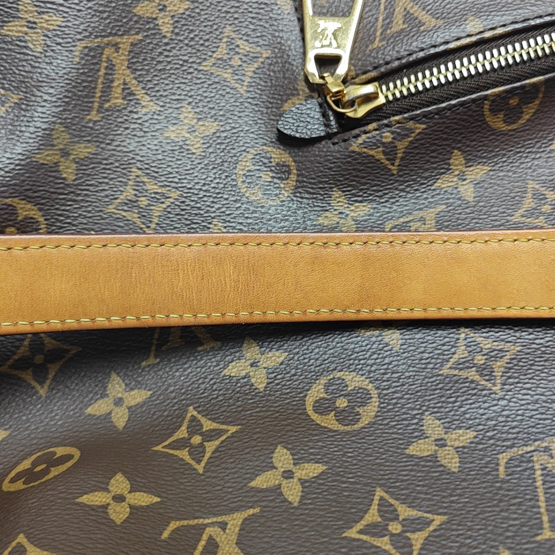 MELIE Monogram Coated Canvas Brown