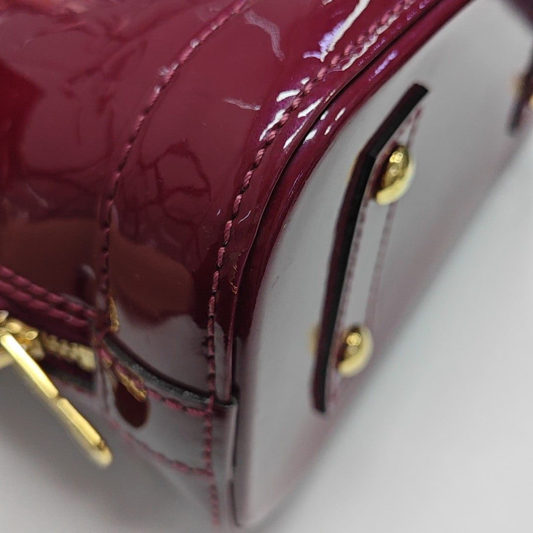 ALMA BB Monogram Patent Leather Red