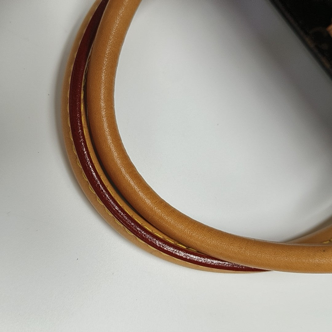 MONTAIGNE GM Monogram Coated Canvas Brown