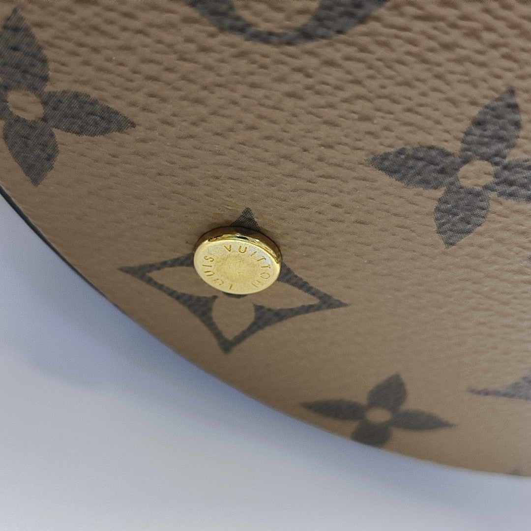 CANNES PM Monogram Coated Canvas Brown
