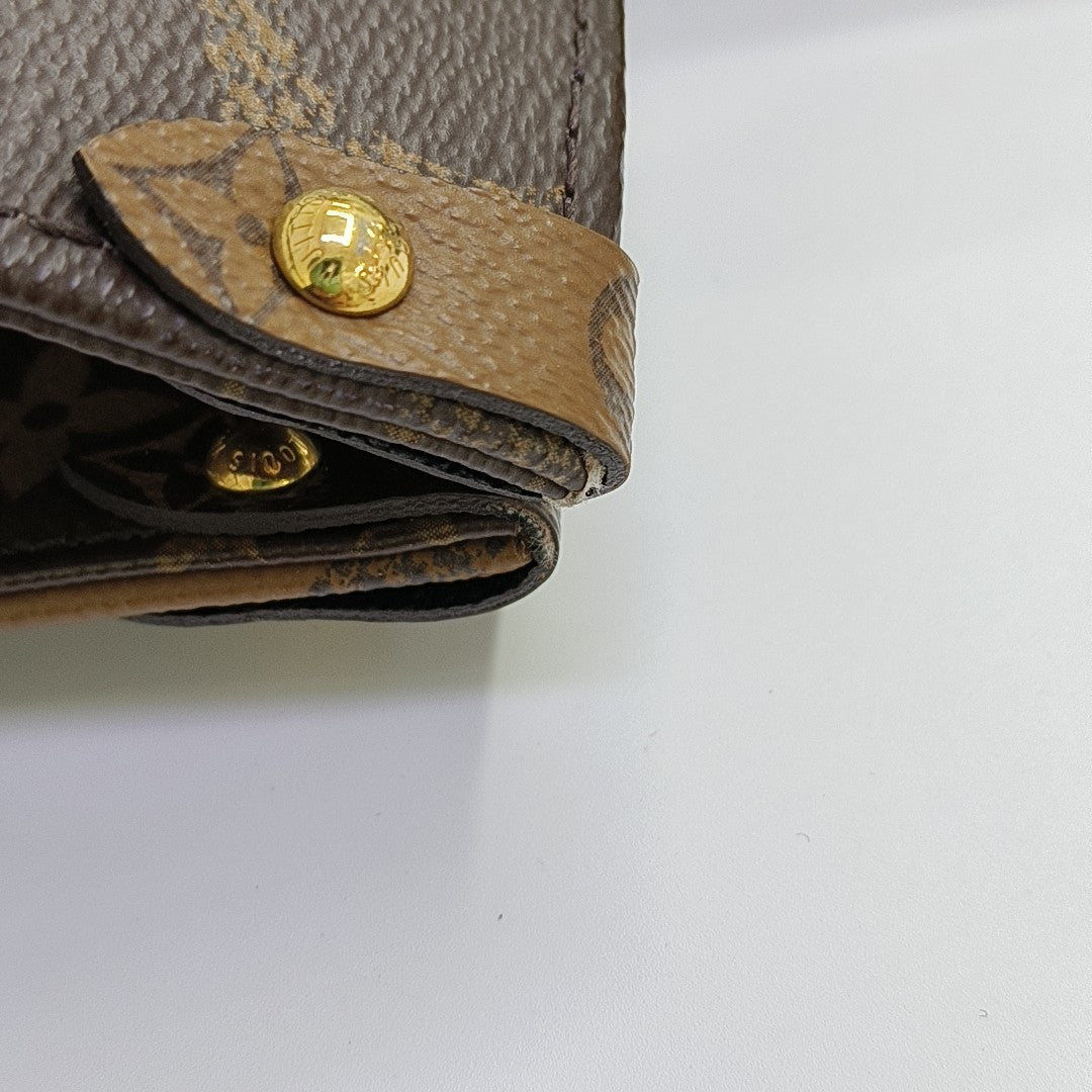 ONTHEGO MM Monogram Coated Canvas Brown
