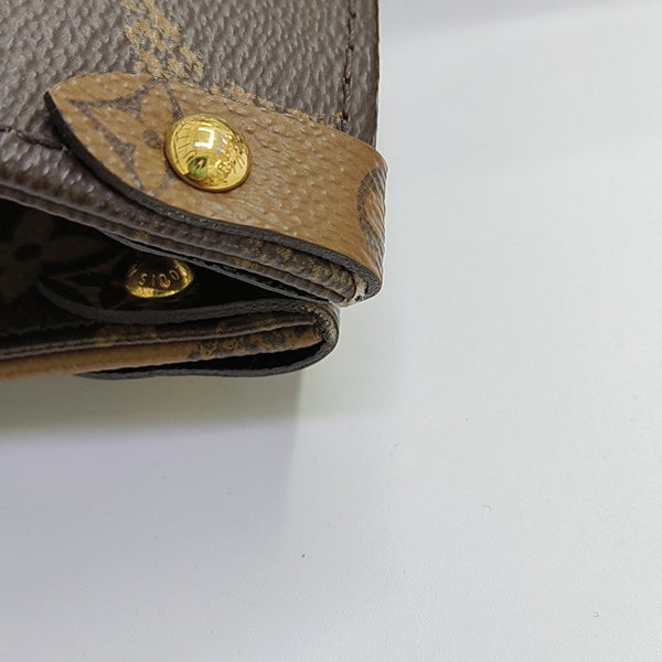 ONTHEGO MM Monogram Coated Canvas Brown